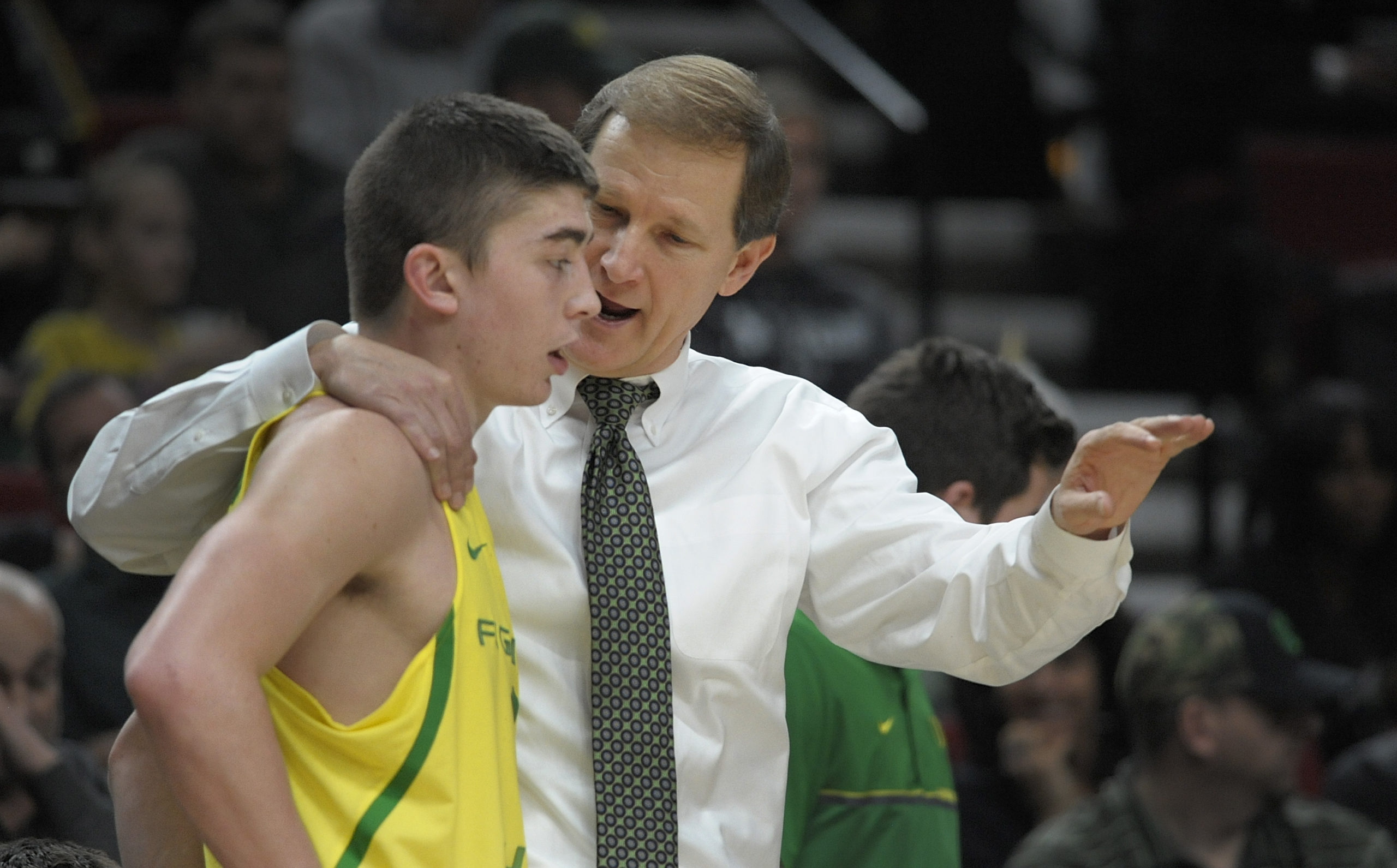 PORTLAND, OR - DECEMBER 17: Head coach Dana Altman of the Oregon Ducks speaks with Payton Pritchard #3 during the second half of the game against the UNLV Rebels at Moda Center on December 17, 2016 in Portland, Oregon.The Ducks won the game 83-63. 